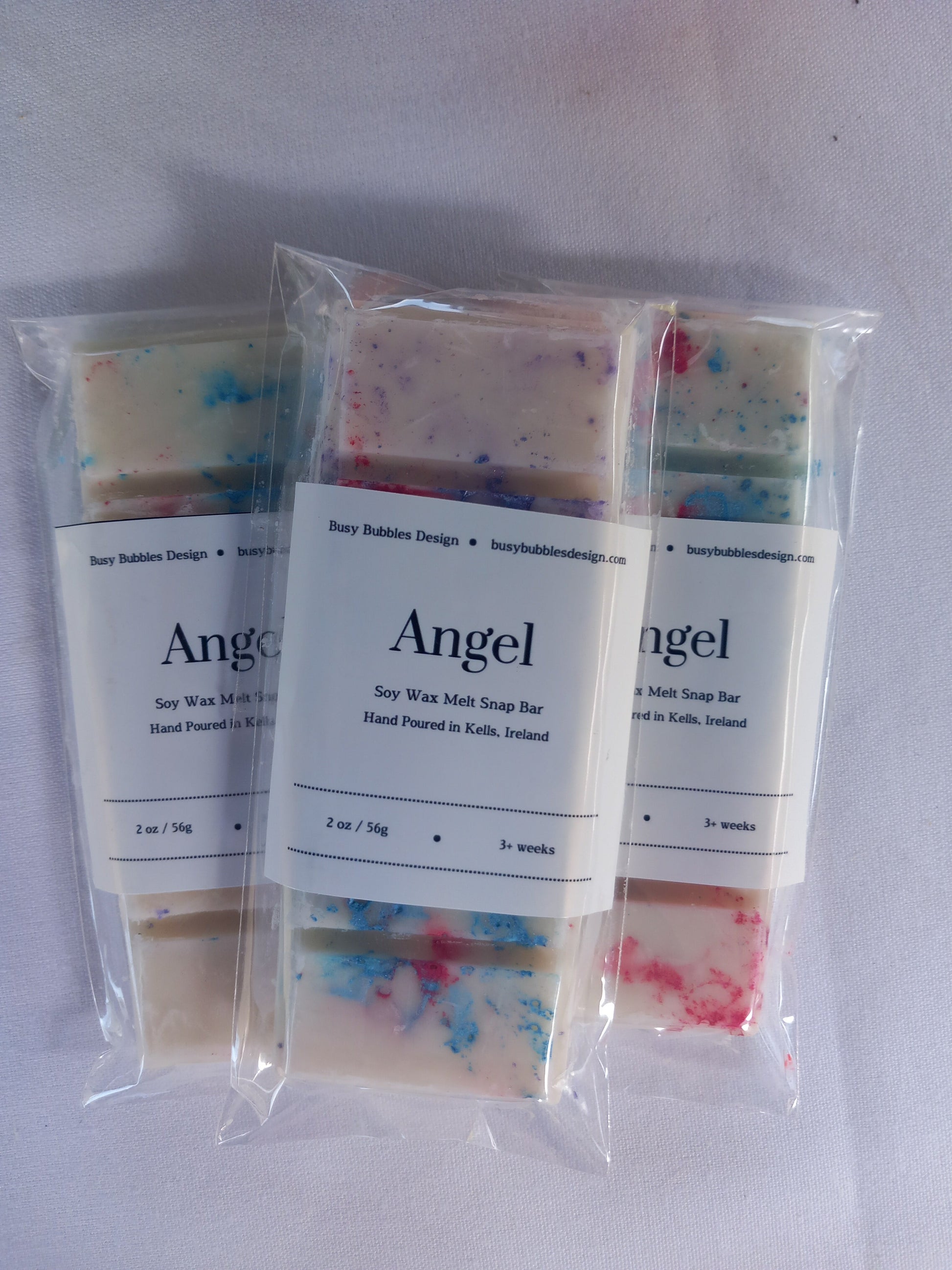 Packaged snap bars with 'Angel' label on a white background